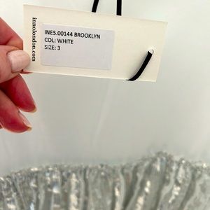 Are you ready to party? Great white cotton blouse with Silver trimmings